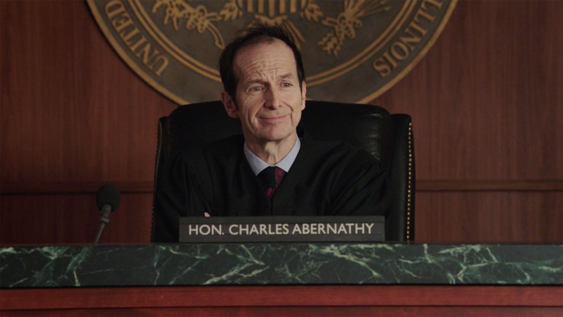 Denis O'Hare as Judge Charles Abernathy