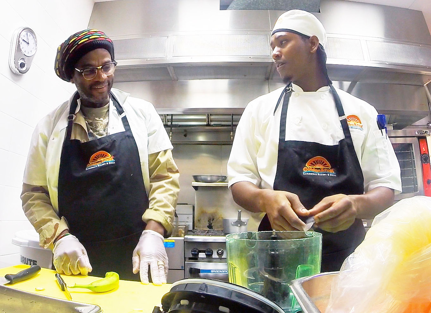 Lowell gets to know Odean, a cook at one of Golden Krust's newest Florida locations.